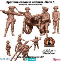 Canon de 6pdr avec servants en uniforme